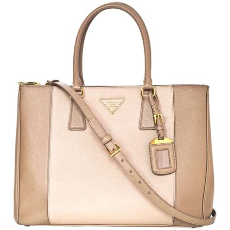 pochette prada visone beige|PRADA Saffiano Lux Medium Parabole Tote Visone.